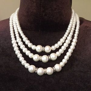 3 strand pearl necklace with matching earrings